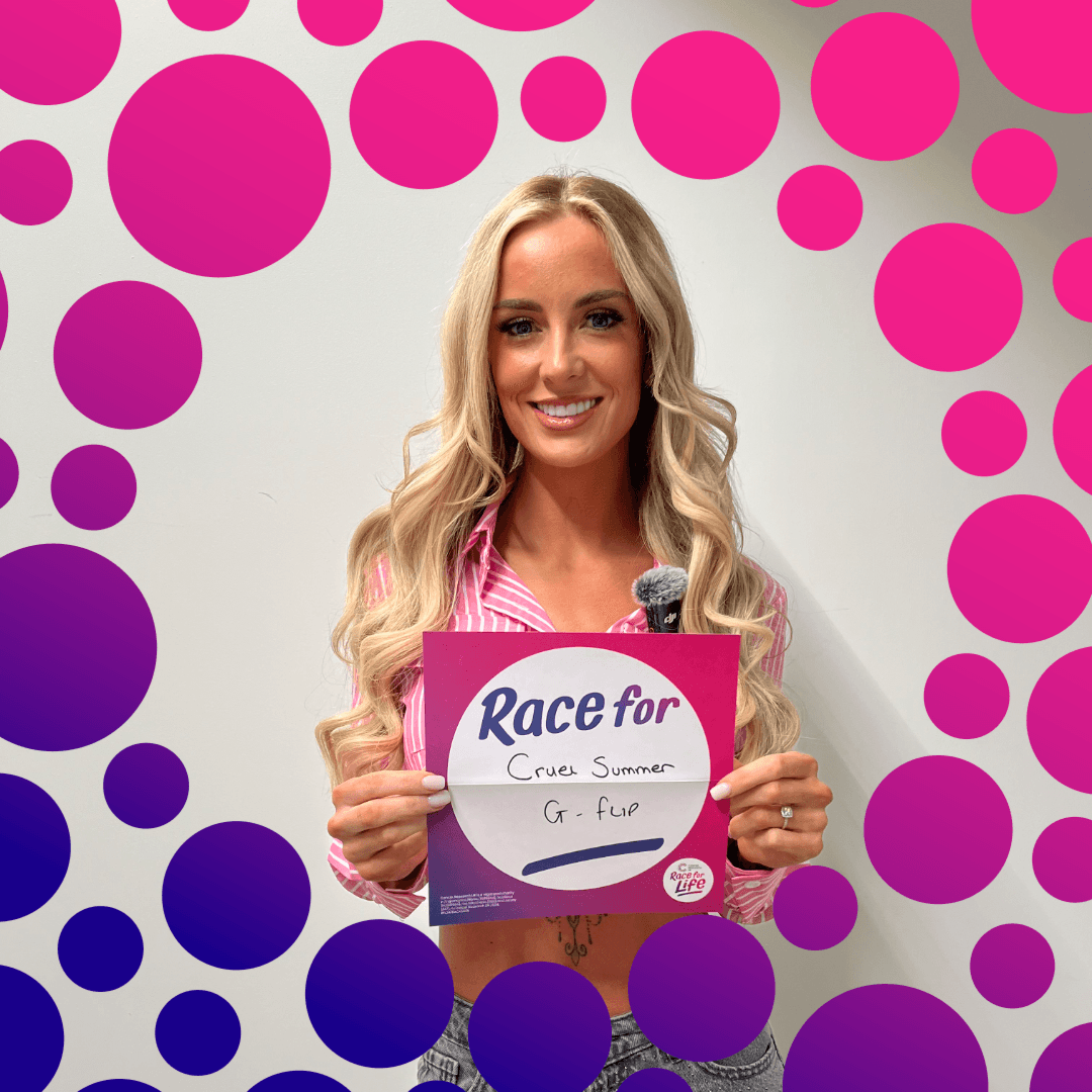 Leanne Quigley holding up her Plays for Life song choice on a backsign.